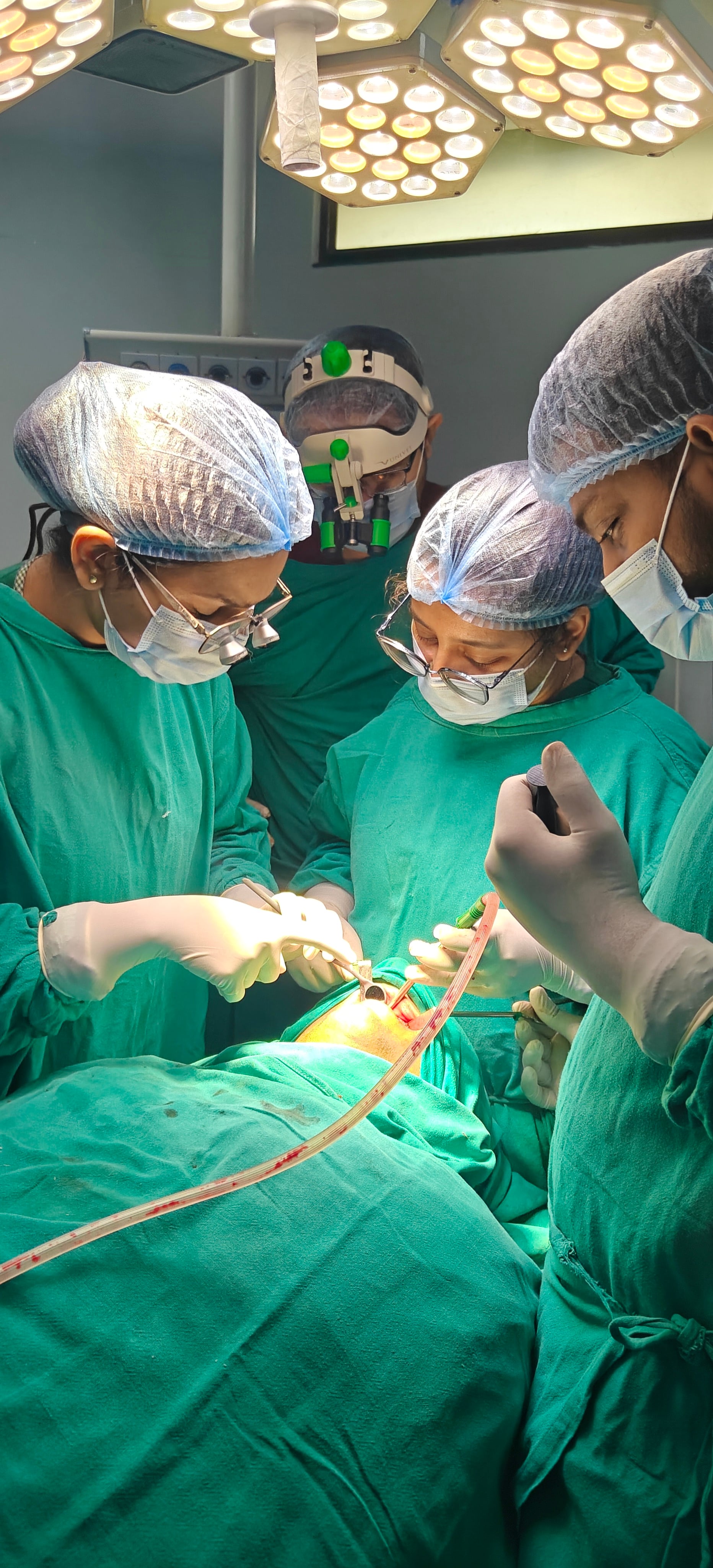 Dr. Bhavya Soni and surgical team performing advanced dental procedure